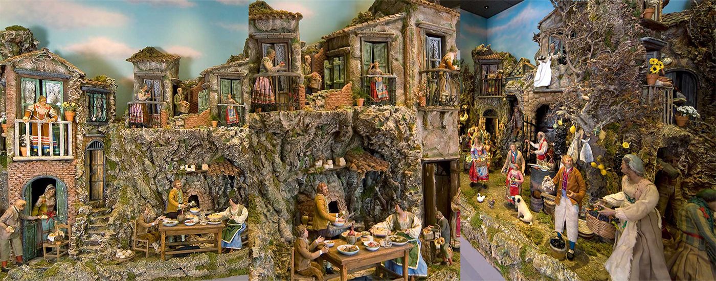Italienische Krippe mit detaillierten Figuren und Gebäuden in einer ländlichen Szene